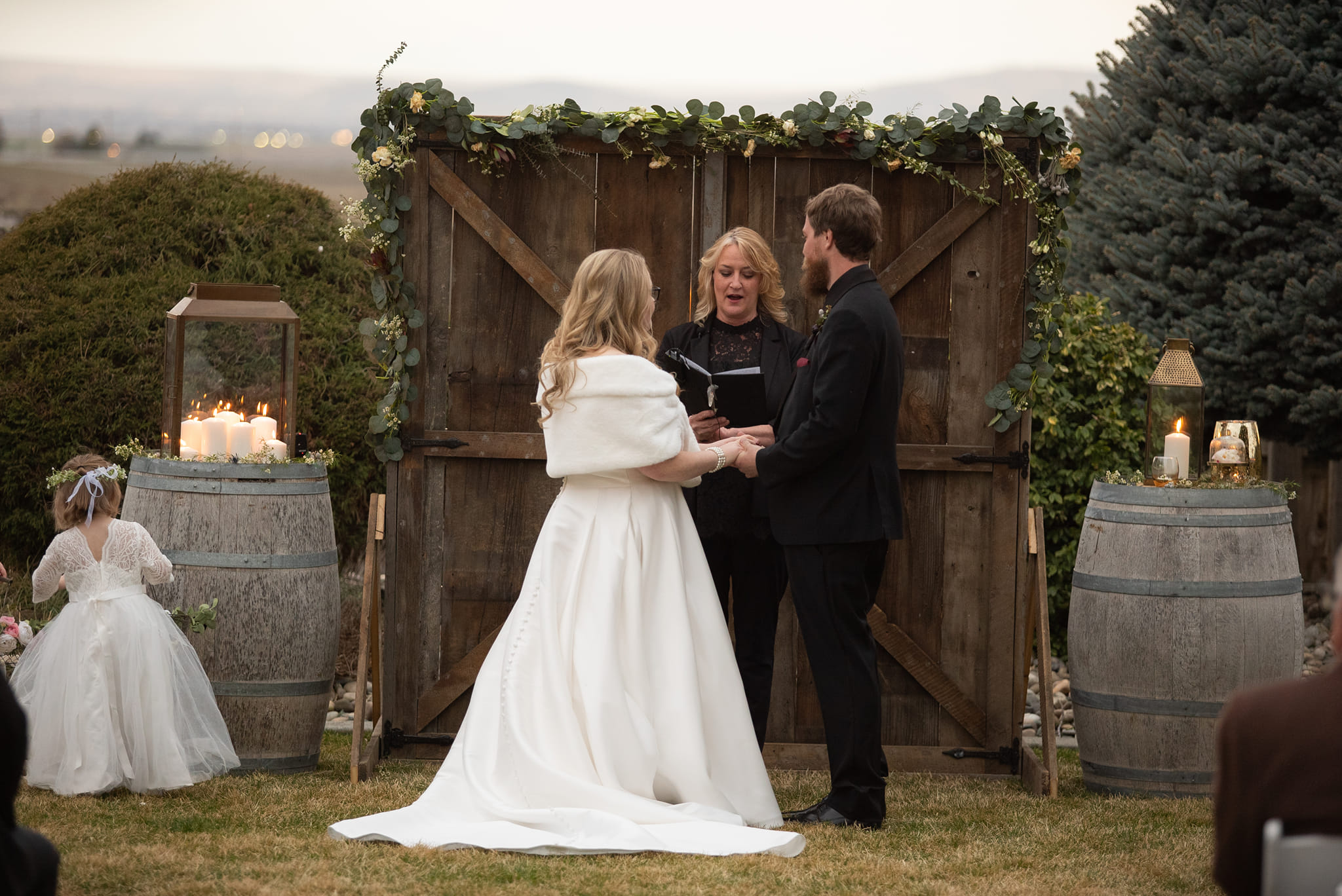 Reverend Stacey Miles guiding a couple through their vows at Stone Ridge Estates